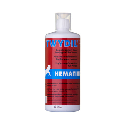 A bottle of Twydile Hematin complementary liquid feedingstuff for horses, featuring a white bottle with a red and blue label.