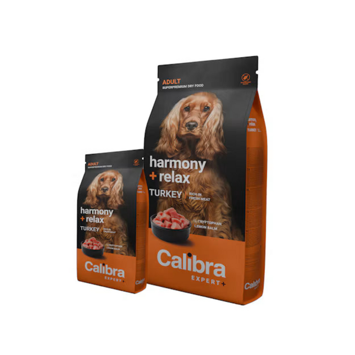 Two bags of Calibra Expert+ Harmony + Relax Turkey adult dry dog food, one large bag and one smaller bag, both featuring a brown Cocker Spaniel on the packaging against a white background.